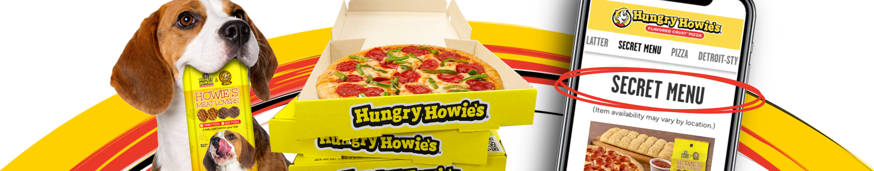 dog holding bag of pizza treats